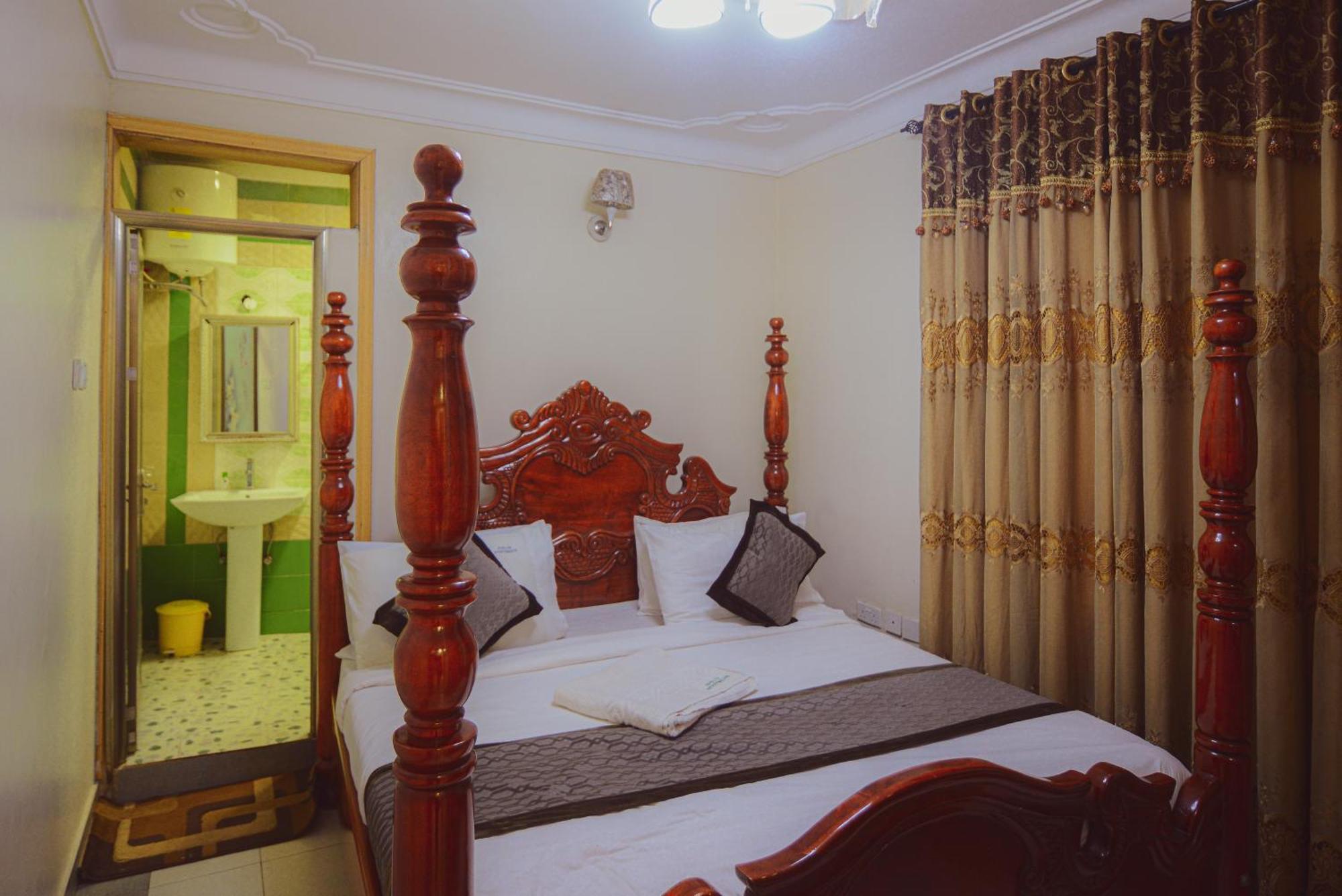 Evelyn Apartments Kyambogo  Экстерьер фото